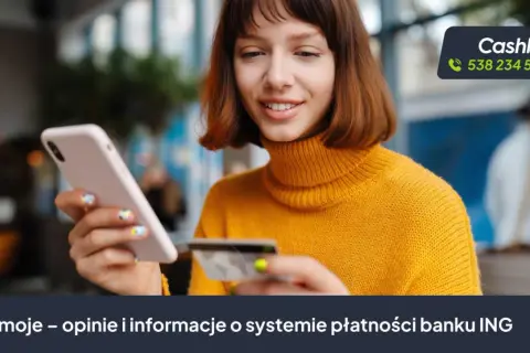 Młoda kobieta z kartą płatniczą i telefonem. Dowiedz się, co to imoje, system płatności banku ING.
