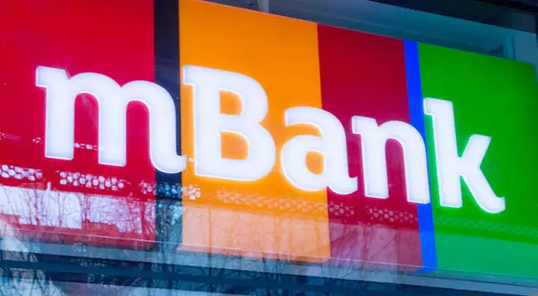Logo mBank z białymi literami na kolorowym tle. Szukasz identyfikator mbank gdzie znajde?