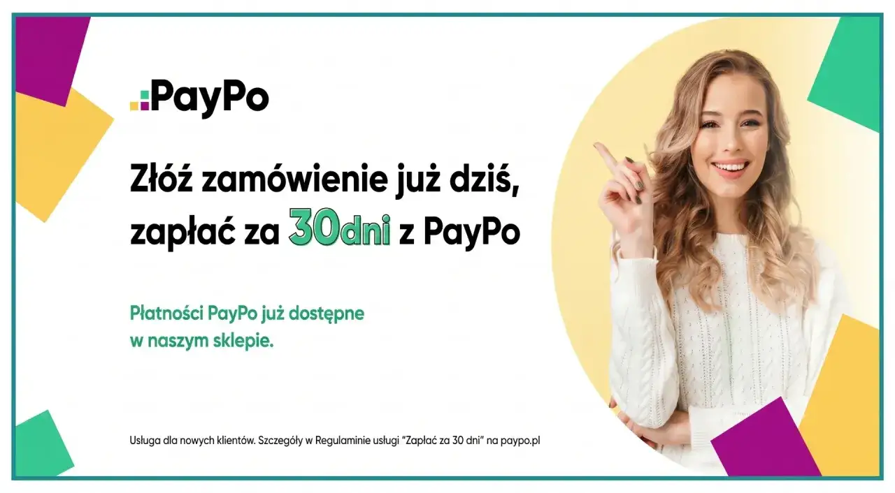 Uśmiechnięta kobieta wskazuje na napis 