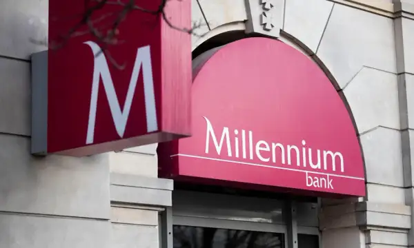 Znak Millenium bank. Dowiedz się, jak zmienić limit główny Millenium, aby lepiej zarządzać finansami.